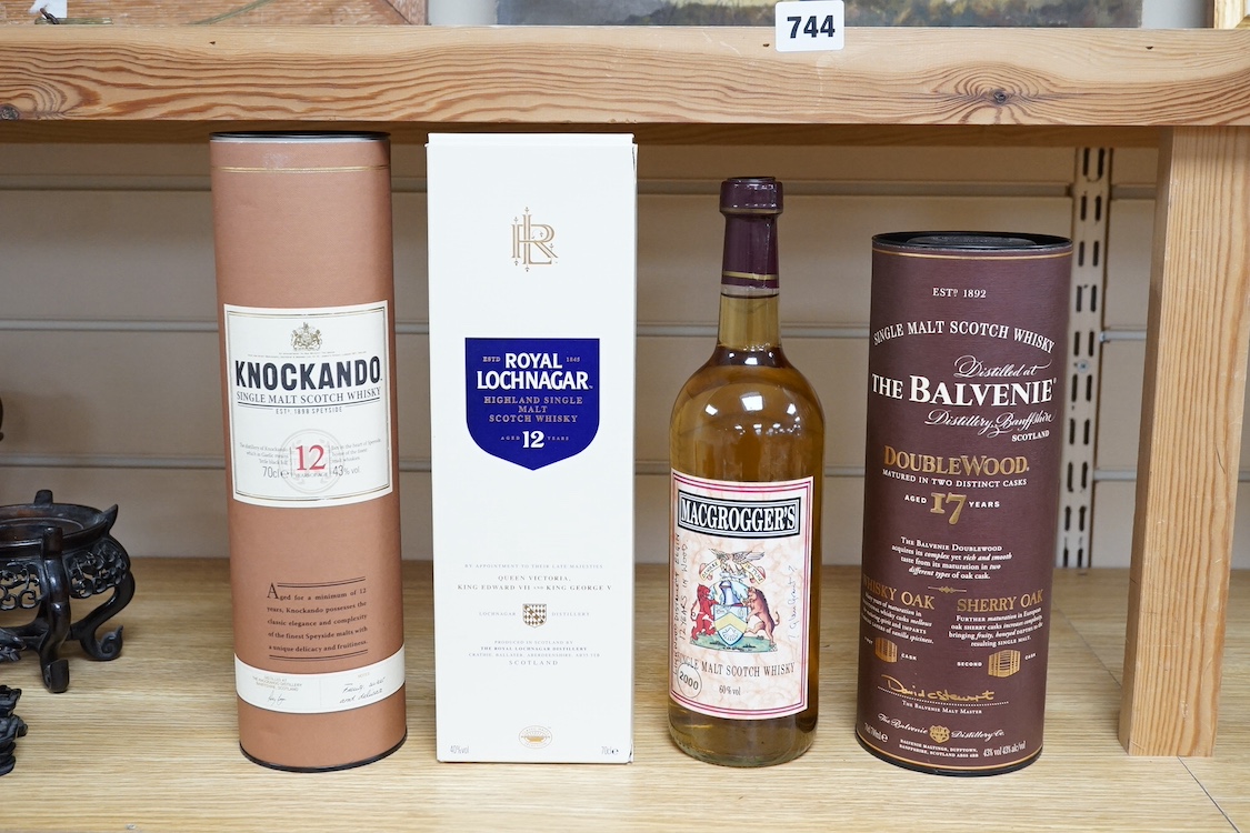 Four various bottles of whisky to include The Balvenie Doublewood 17 year, Royal Lochnagar 12 year, Knockando 12 year and Macroggers. Condition - varies
